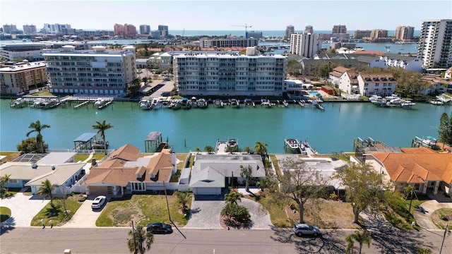 bird's eye view featuring a view of city and a water view