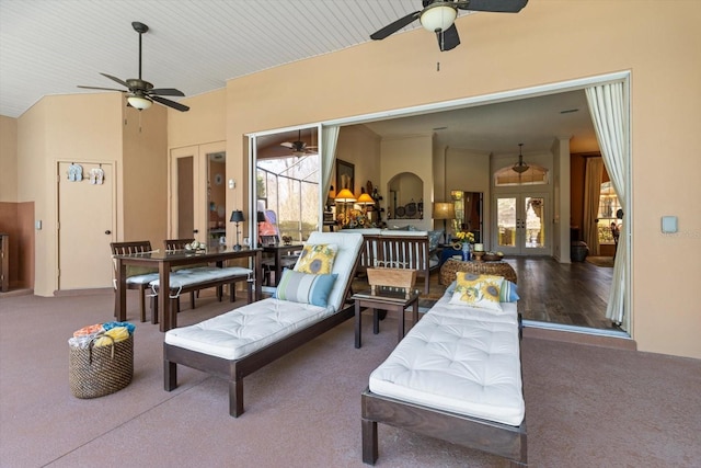 view of patio featuring an outdoor living space, french doors, outdoor dining area, and a ceiling fan