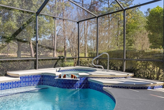 pool with glass enclosure and an in ground hot tub