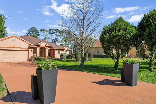 view of front of property featuring stucco siding, an attached garage, concrete driveway, and a front yard