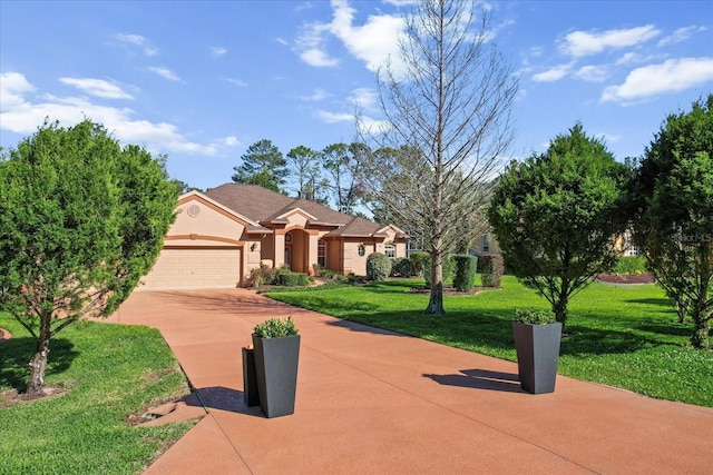 view of front facade with a front lawn, a garage, driveway, and stucco siding