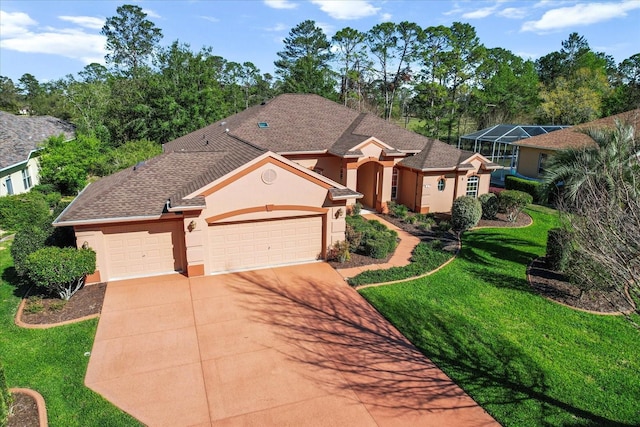 view of front of house featuring stucco siding, driveway, a front lawn, roof with shingles, and an attached garage