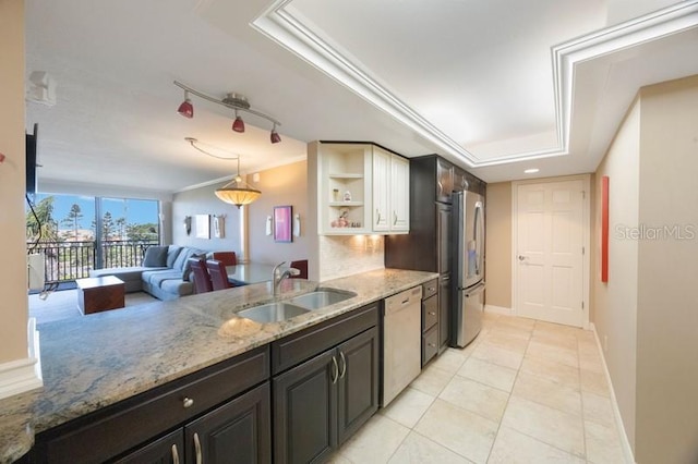 5700 Escondida Blvd S Unit 506, Saint Petersburg, FL 33715 - kitchen with freestanding refrigerator, open shelves, a sink, light stone counters, and dishwasher