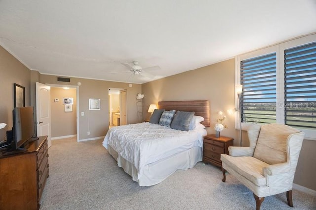 5700 Escondida Blvd S Unit 506, Saint Petersburg, FL 33715 - bedroom with light carpet, baseboards, visible vents, and ceiling fan