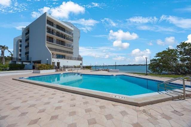 5700 Escondida Blvd S Unit 506, Saint Petersburg, FL 33715 - pool featuring a water view and a patio area
