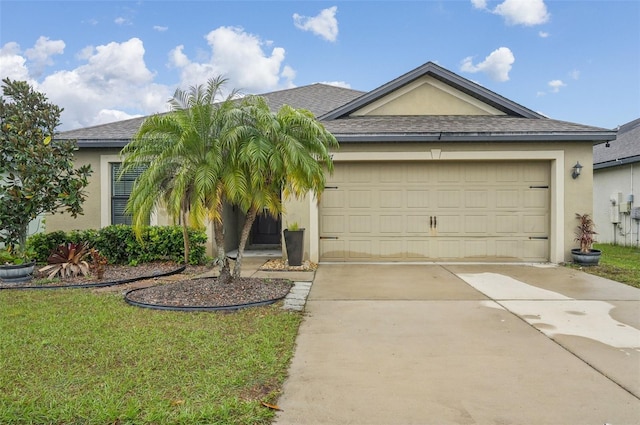 view of front facade featuring stucco siding, an attached garage, concrete driveway, and a shingled roof