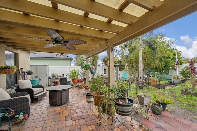 view of patio featuring a ceiling fan and a fenced backyard