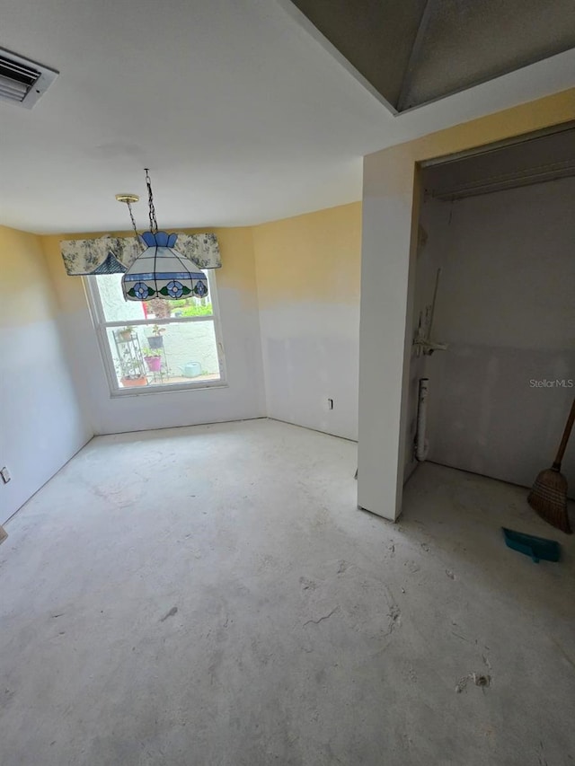 interior space featuring visible vents and concrete flooring