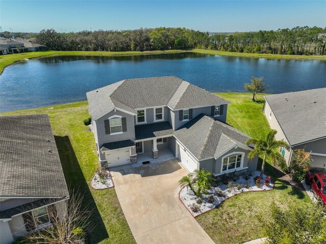 drone / aerial view featuring a water view