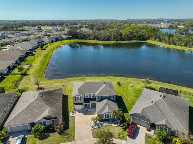 aerial view featuring a residential view and a water view