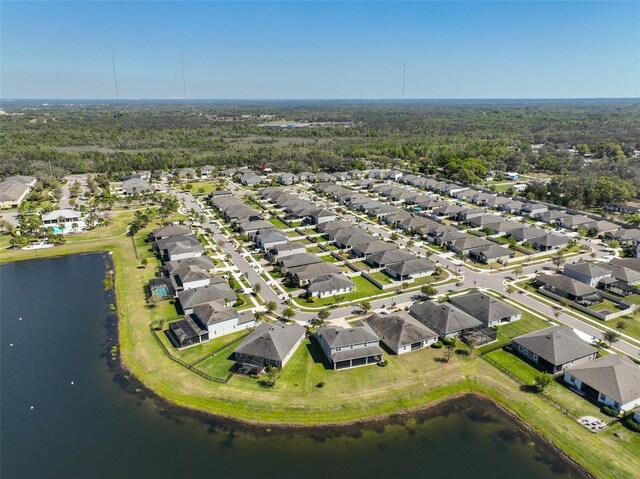 aerial view featuring a water view and a residential view