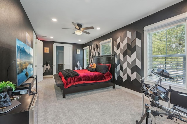 carpeted bedroom with recessed lighting, baseboards, and ceiling fan