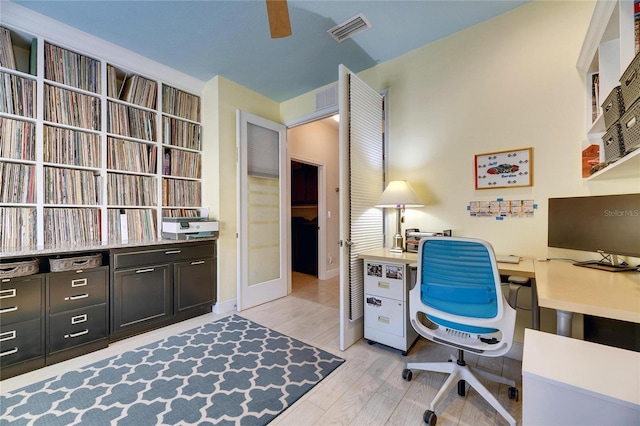 office area featuring visible vents and light wood-style floors