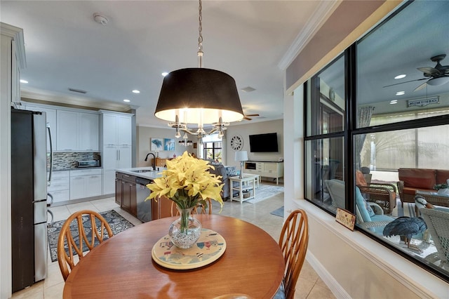 dining room with visible vents, ornamental molding, ceiling fan with notable chandelier, recessed lighting, and light tile patterned floors