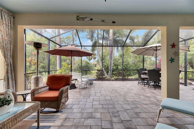 view of patio with a lanai