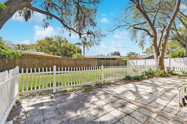 view of patio featuring a fenced front yard