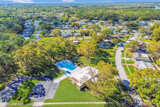 bird's eye view with a forest view and a residential view