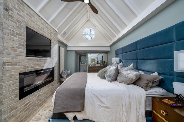 bedroom featuring beam ceiling, visible vents, a brick fireplace, and high vaulted ceiling