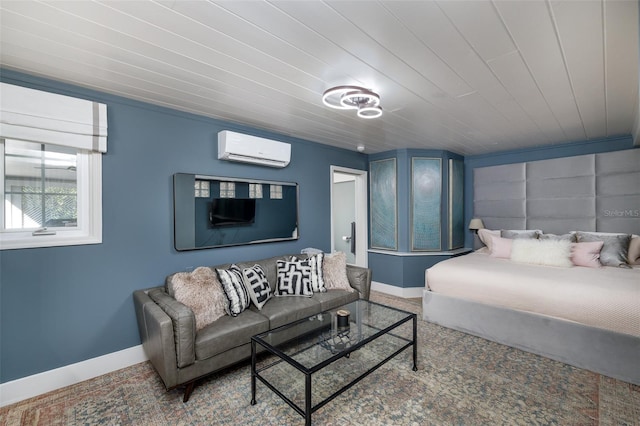 bedroom with a wall mounted air conditioner, baseboards, and wood ceiling