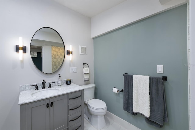 bathroom featuring vanity, baseboards, visible vents, toilet, and marble finish floor