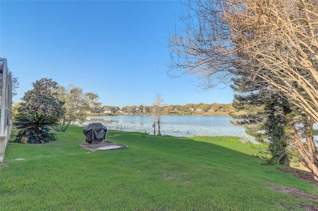 view of yard with a water view