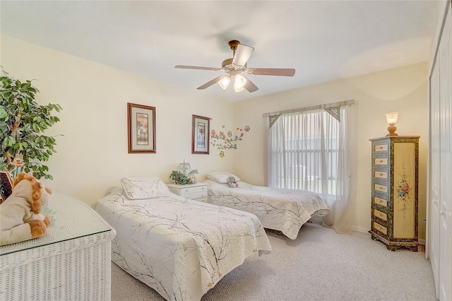 10837 Versailles Blvd, Clermont, FL 34711 - bedroom with light colored carpet and ceiling fan