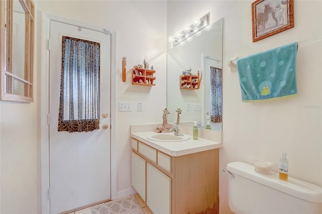 10837 Versailles Blvd, Clermont, FL 34711 - bathroom featuring vanity and toilet