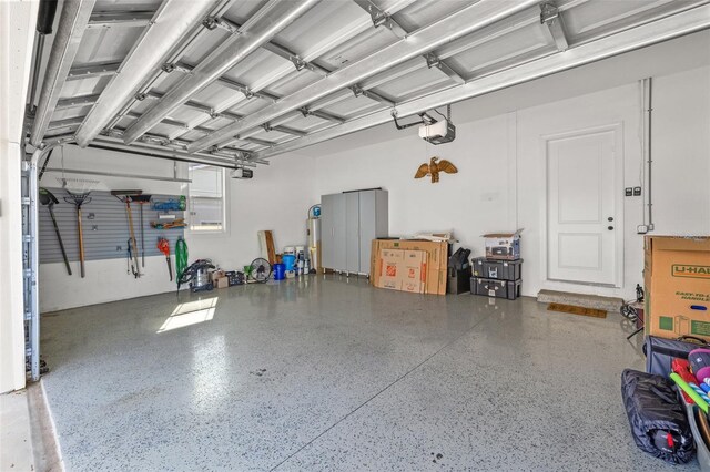 445 29th Ave N, Saint Petersburg, FL 33704 - garage with a garage door opener