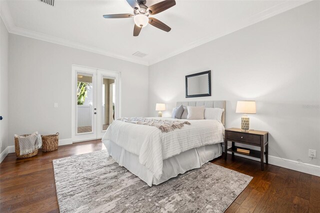 445 29th Ave N, Saint Petersburg, FL 33704 - bedroom featuring baseboards, crown molding, dark wood finished floors, ceiling fan, and french doors