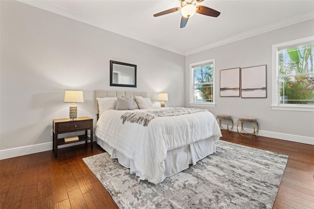 445 29th Ave N, Saint Petersburg, FL 33704 - bedroom featuring multiple windows, baseboards, ornamental molding, and dark wood finished floors