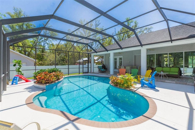 view of swimming pool featuring a fenced in pool, fence, french doors, a patio area, and a ceiling fan