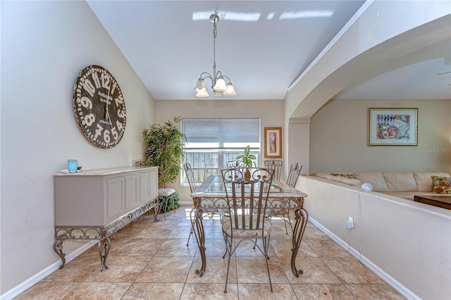 dining space featuring an inviting chandelier, light tile patterned flooring, and baseboards