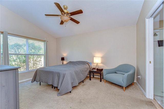 bedroom featuring baseboards, carpet floors, lofted ceiling, and ceiling fan