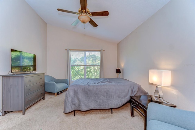 bedroom featuring light carpet, ceiling fan, and vaulted ceiling