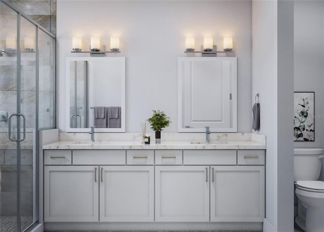 bathroom featuring double vanity, a shower stall, toilet, and a sink