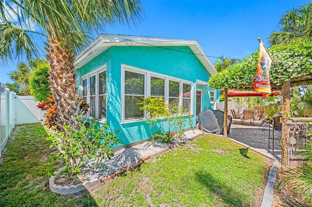 exterior space with a fenced backyard