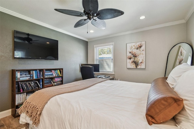 bedroom with recessed lighting, crown molding, baseboards, and wood finished floors