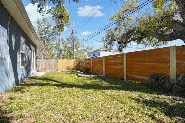 view of yard featuring a fenced backyard