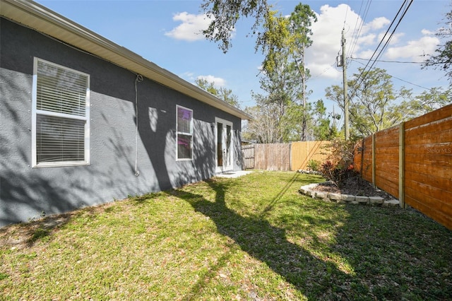 view of yard featuring a fenced backyard