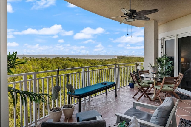 balcony featuring ceiling fan