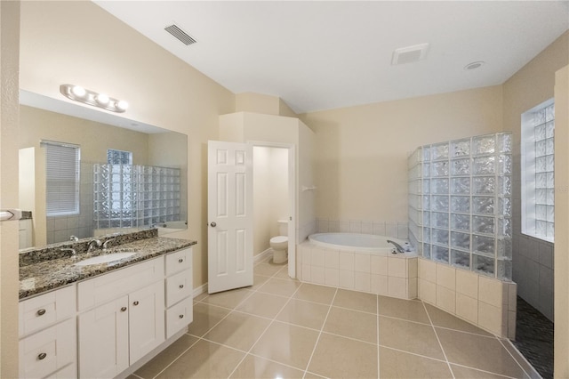 full bath featuring visible vents, a walk in shower, toilet, tile patterned floors, and vanity