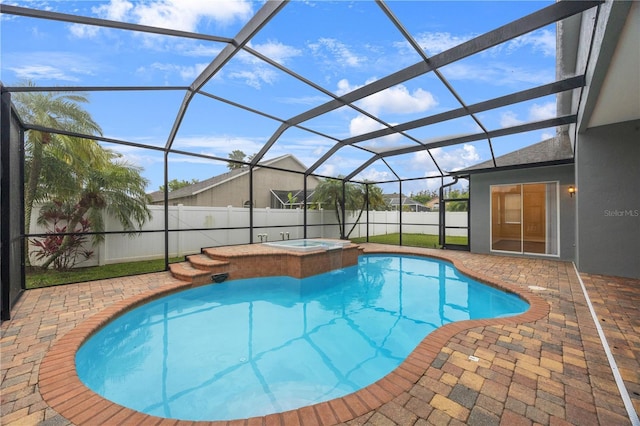 view of pool featuring a patio area, a fenced in pool, an in ground hot tub, and fence