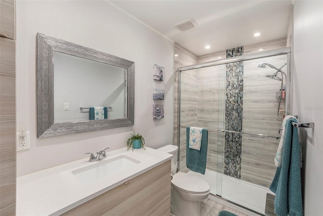 full bathroom featuring visible vents, a shower stall, toilet, recessed lighting, and vanity