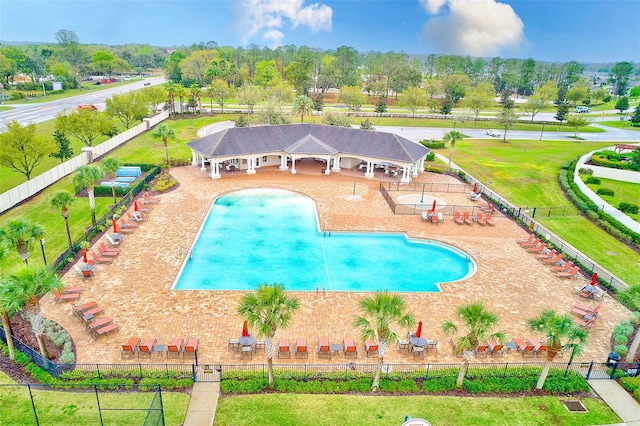 community pool featuring a gazebo, fence, and a patio