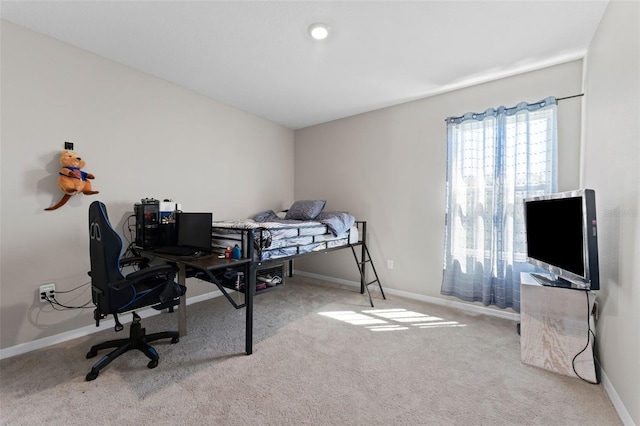 bedroom featuring carpet flooring and baseboards