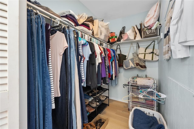 spacious closet with wood finished floors