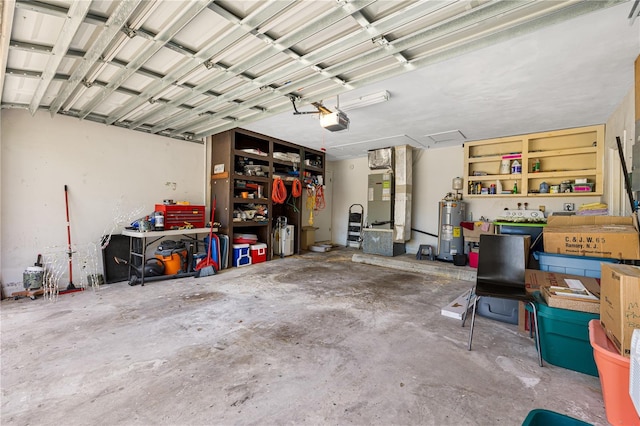 garage with heating unit, electric water heater, and a garage door opener