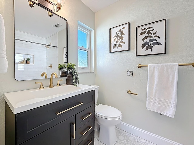 full bathroom with visible vents, baseboards, walk in shower, toilet, and vanity