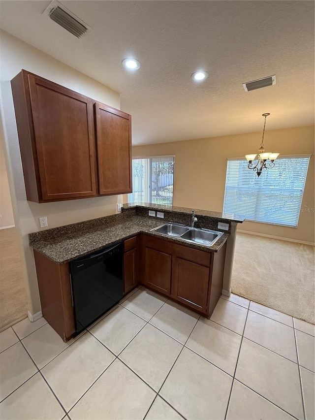 kitchen featuring visible vents, light colored carpet, black dishwasher, and a sink