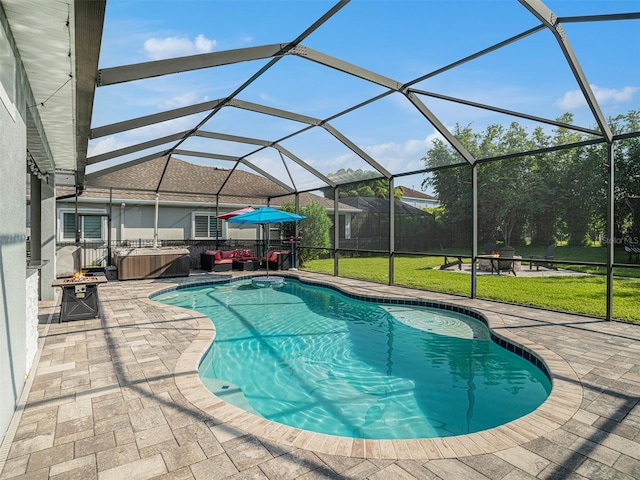 pool featuring a lawn, glass enclosure, and a patio